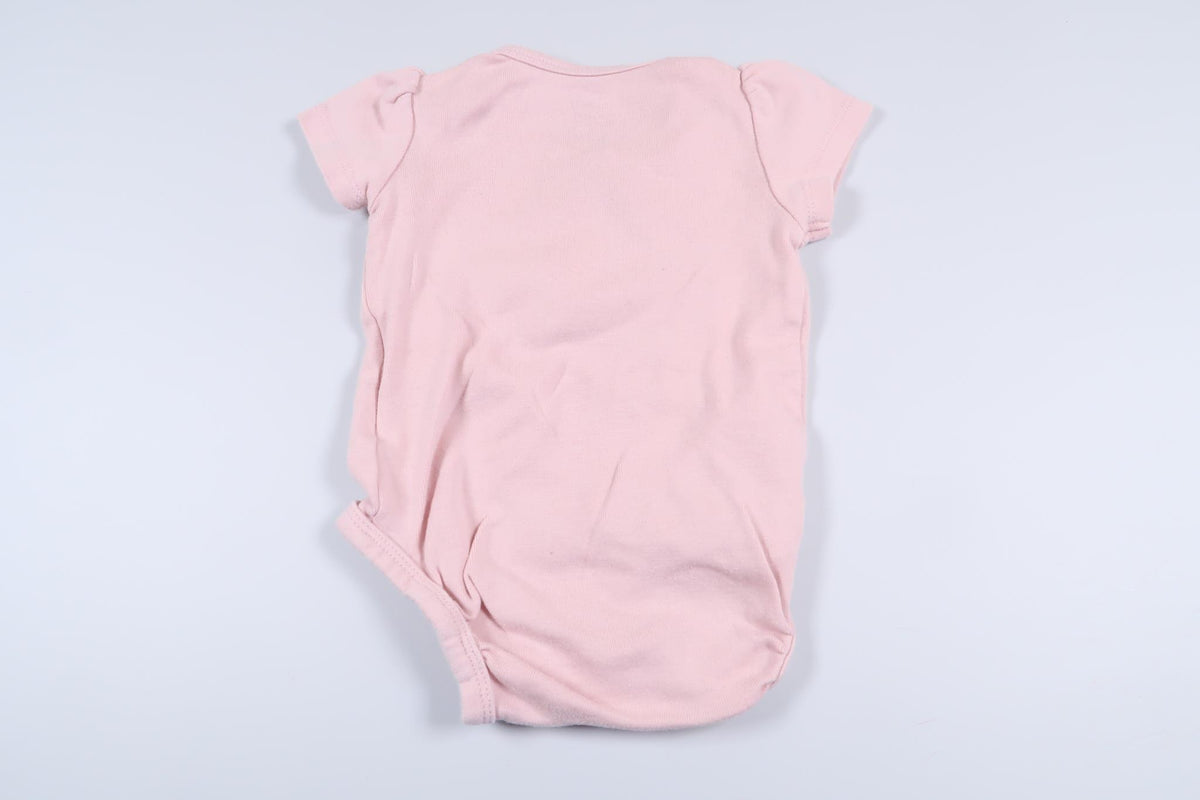 Rosa body från H&M i storlek 62