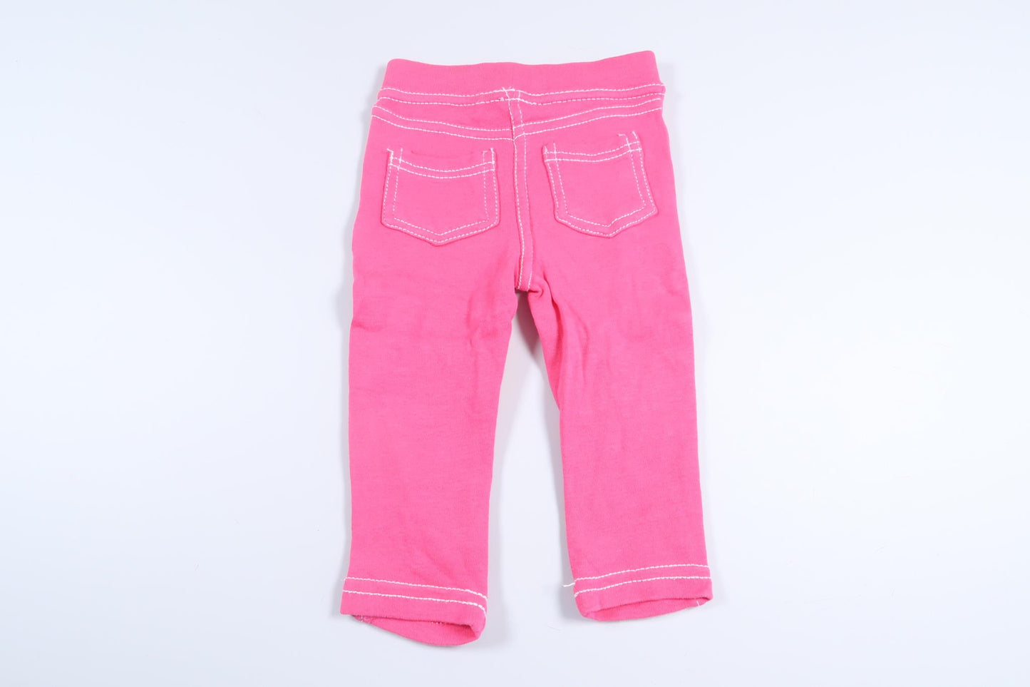 Rosa byxor från Mana i storlek 74