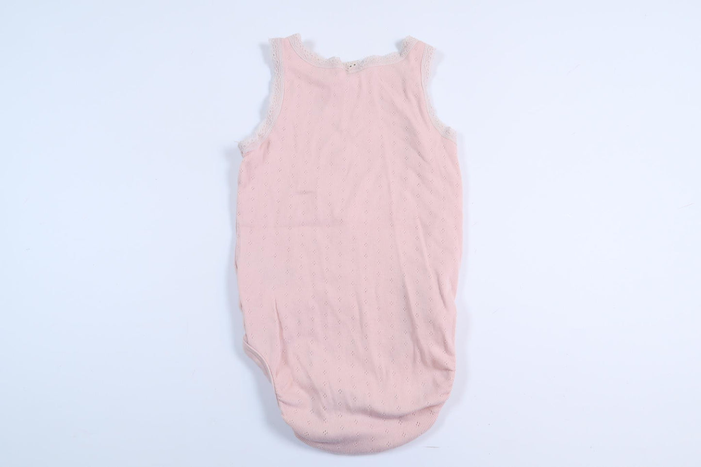 Rosa linnebody från H&M i storlek 80