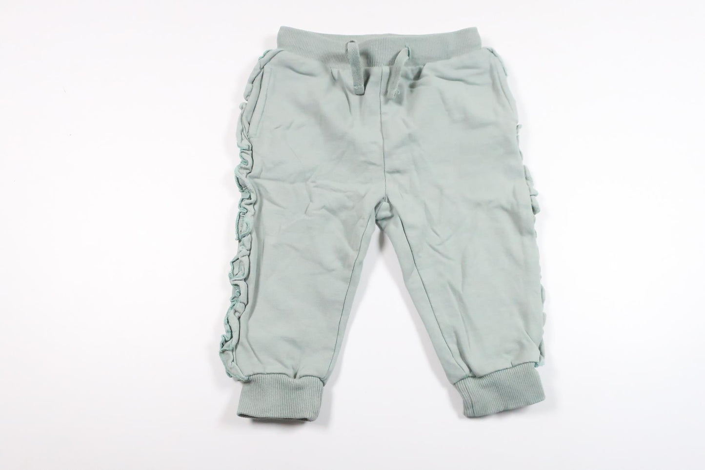 Byxor med volang från Sweetie - Storlek 74 - Blå