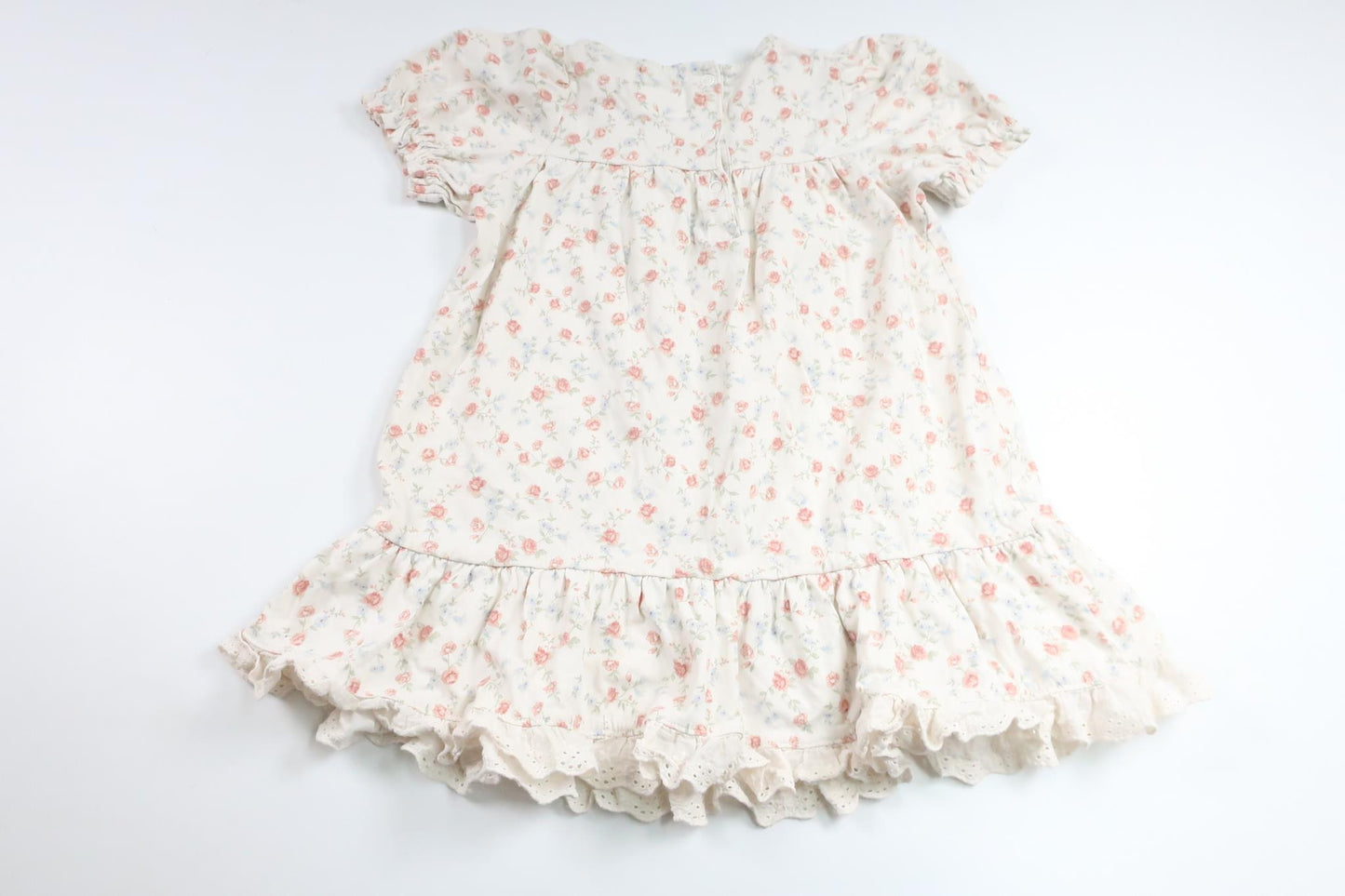 Blommig klänning från Newbie - Storlek 98 - Vit