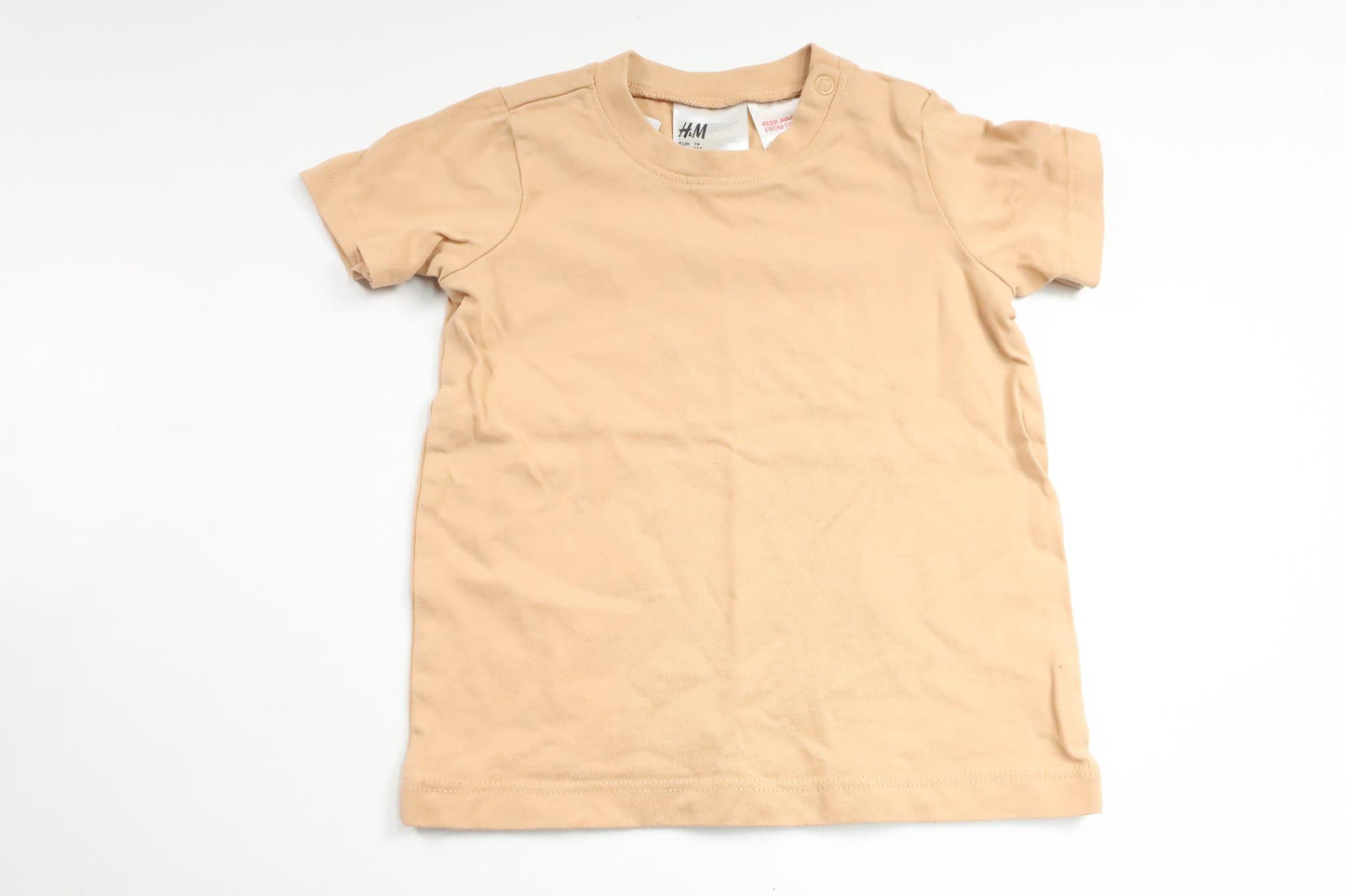 T-shirt från H&M - Storlek 74 - Beige