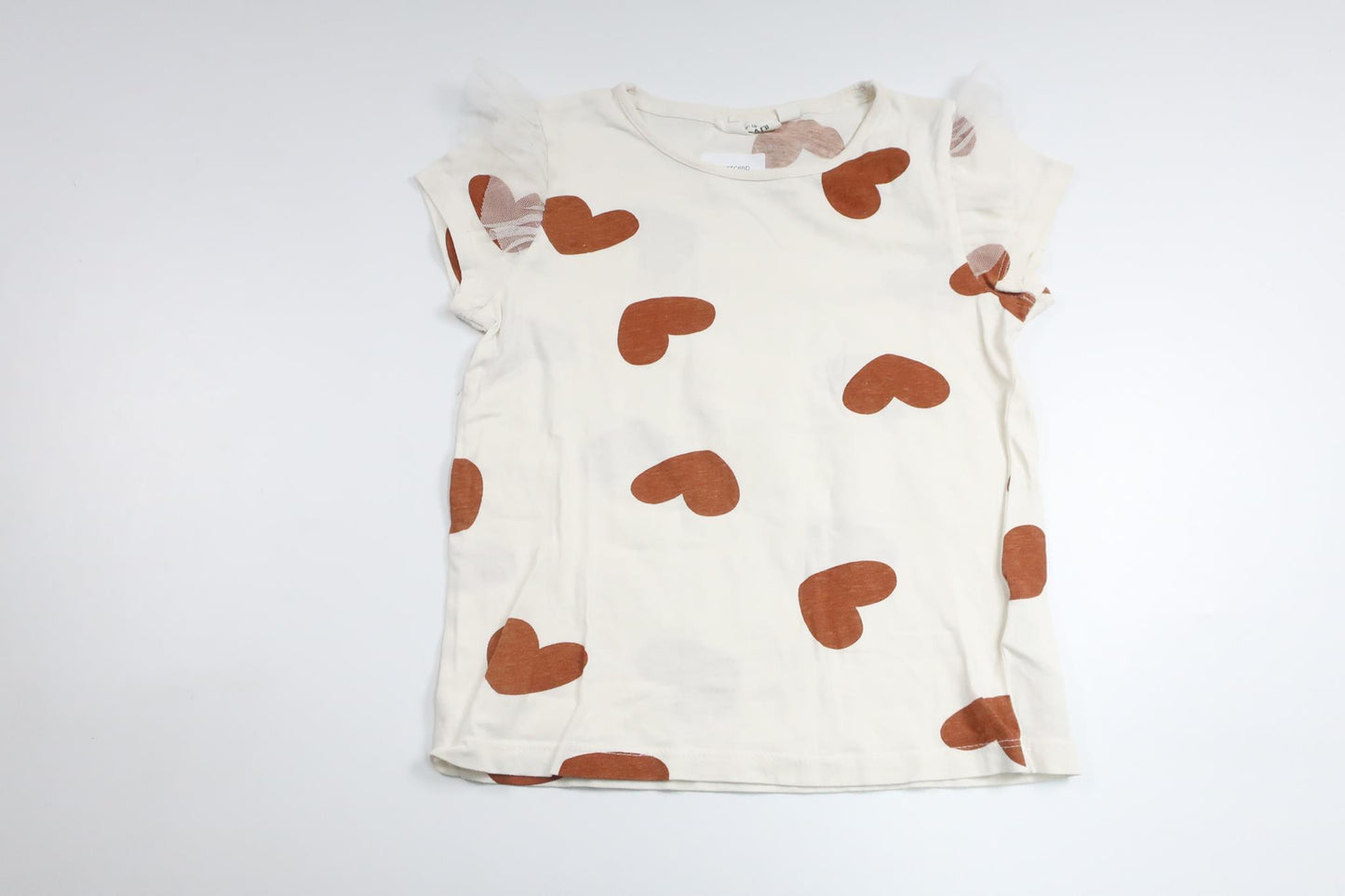 Tröja med hjärtan från Kappahl - Storlek 110/116 - Benvit