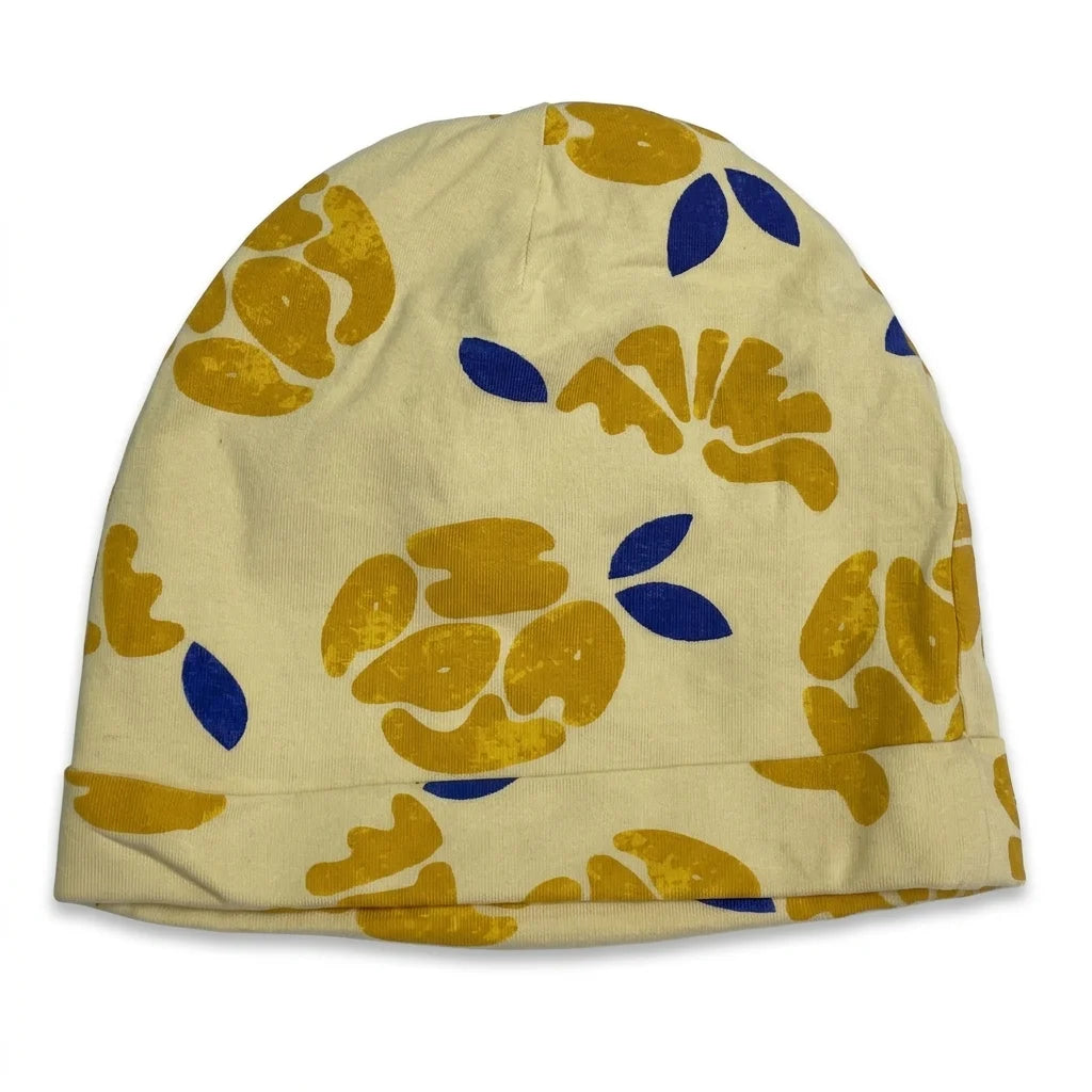 Blommig mössa från Mini Gina Tricot - Storlek 48/50 - Gul