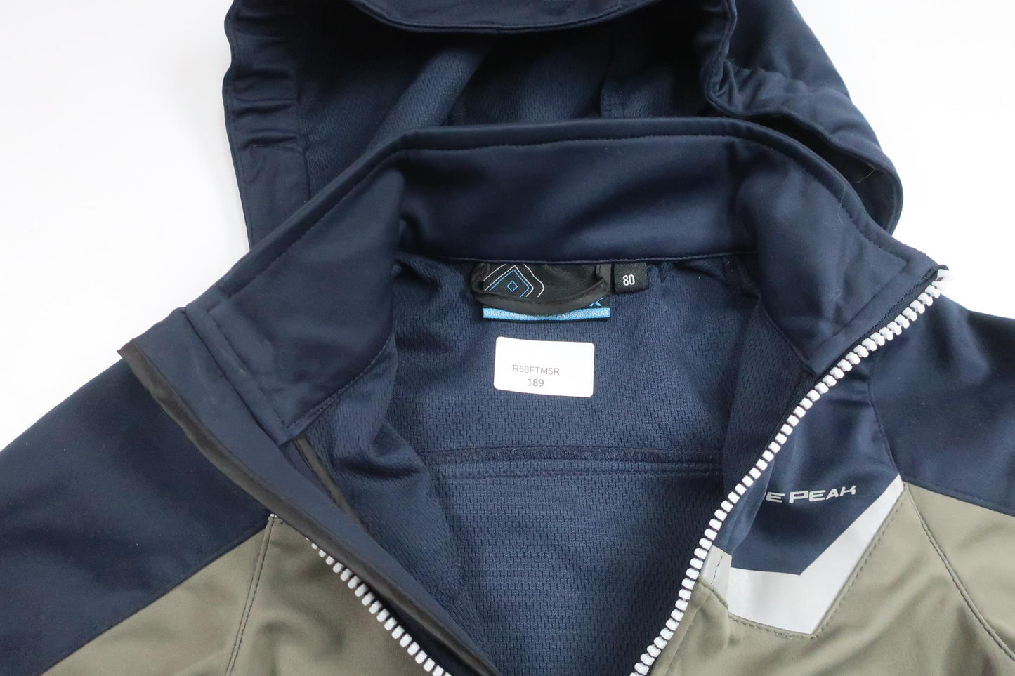 Jacka i softshell från On The Peak - Storlek 80 - Marinblå