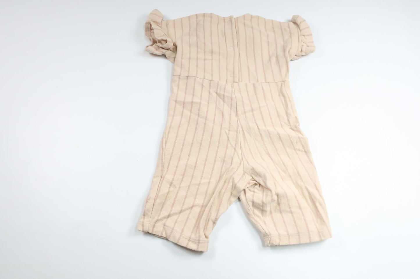 Randig jumpsuit från H&M - Storlek 74 - Beige