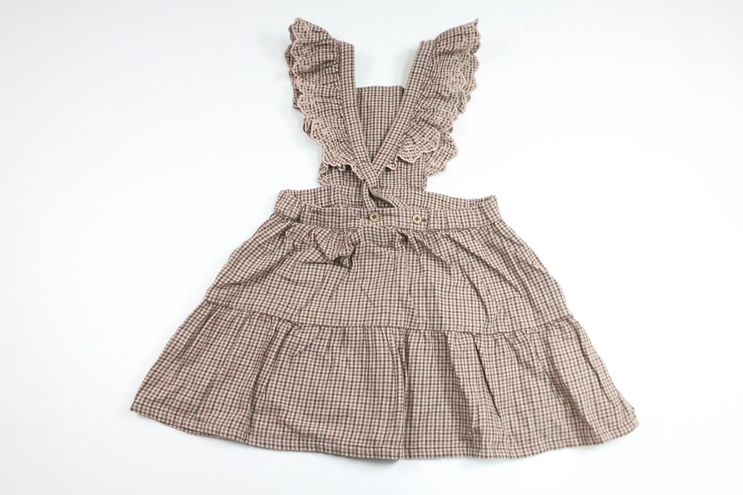 Rutig hängselklänning från Newbie - Storlek 116 - Brun