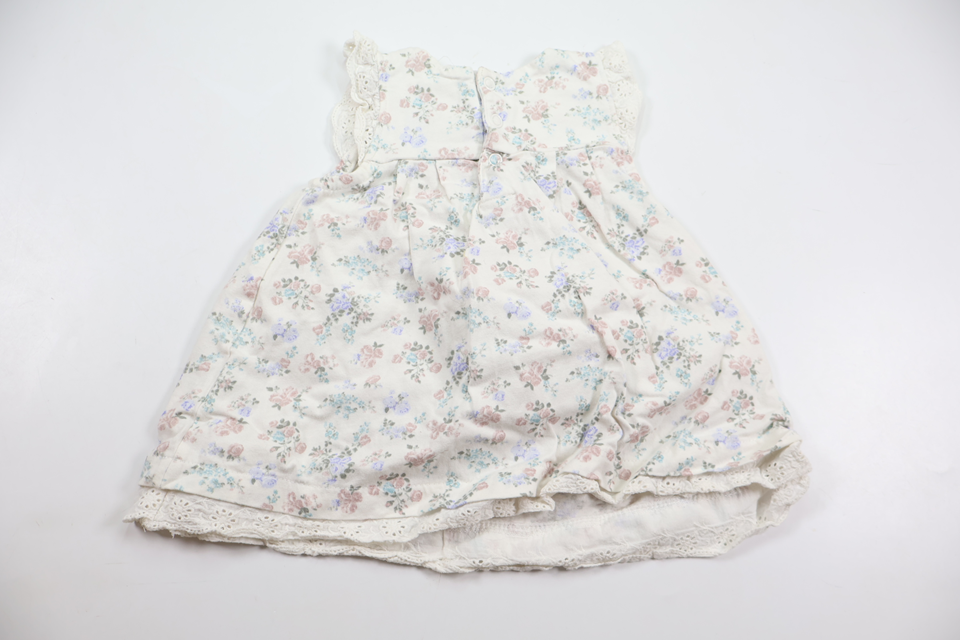 Blommig klänning från Newbie - Storlek 68 - Vit