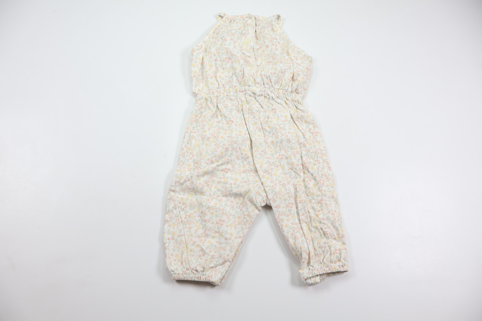 Blommig jumpsuit från Newbie - Storlek 62 - Vit