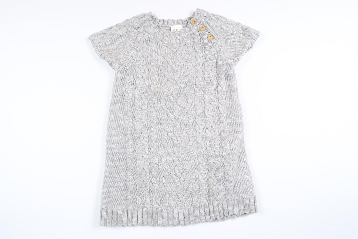 Grå stickad klänning från H&M i storlek 74