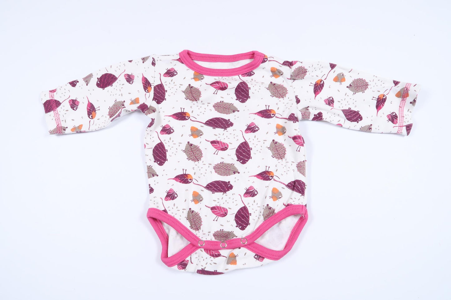 Vit långärmad body med djur från Minikids i storlek 50/56