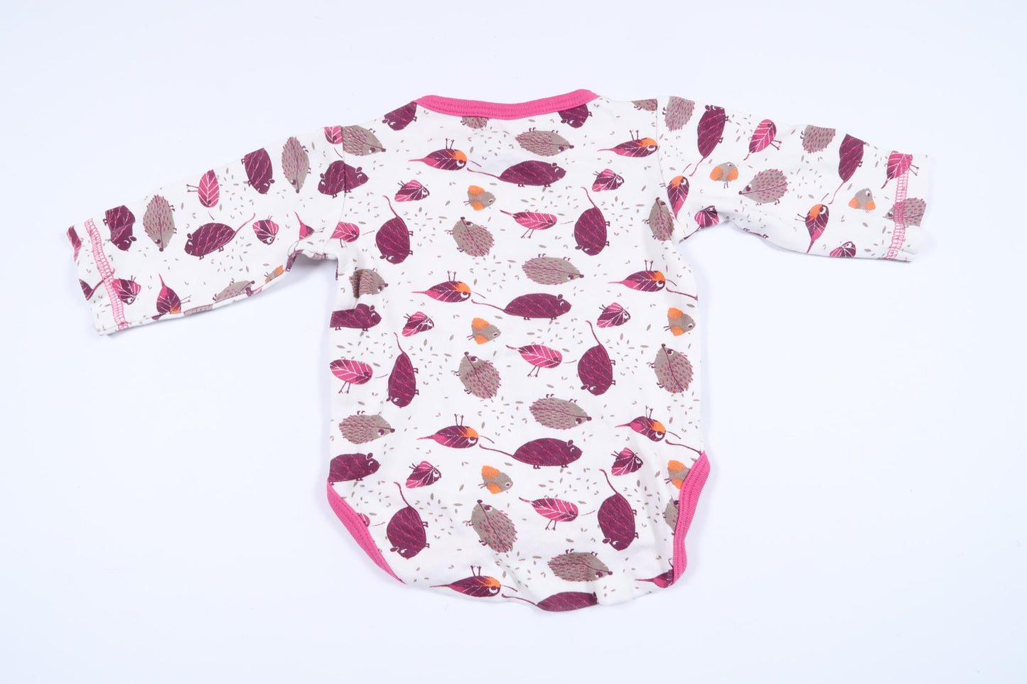 Vit långärmad body med djur från Minikids i storlek 50/56