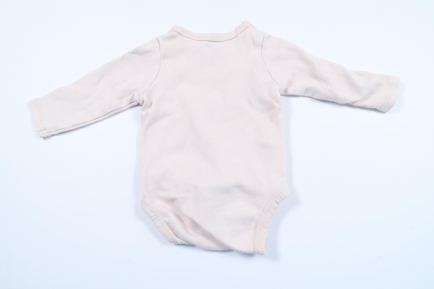 Rosa body från H&M i storlek 56