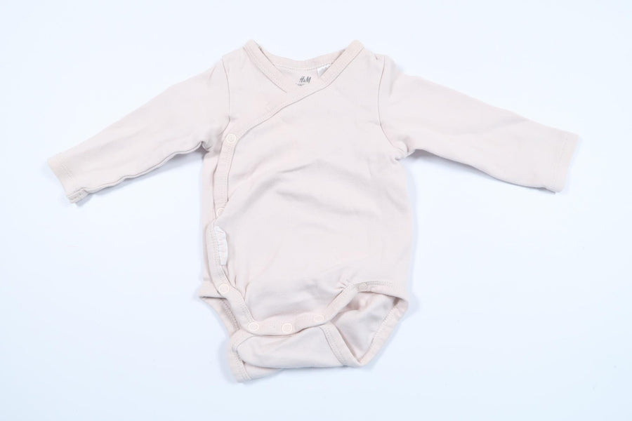 Rosa body från H&M i storlek 56