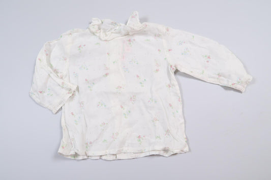 Vit blus med blommor från Bonpoint i storlek 68