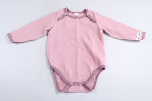 Rosa långärmad body i storlek 68