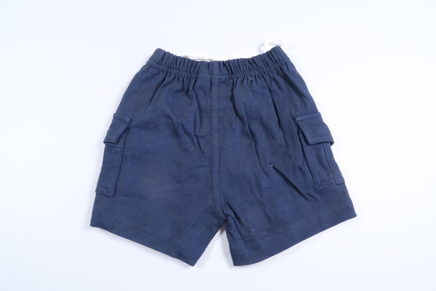 Marinblåa shorts från Disney i storlek 56