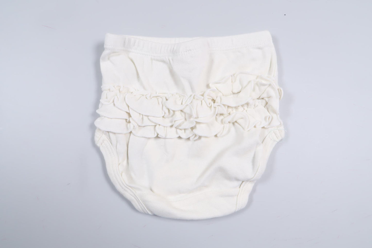 Vita blöjtrosor med volang från Lindex i storlek 50/56