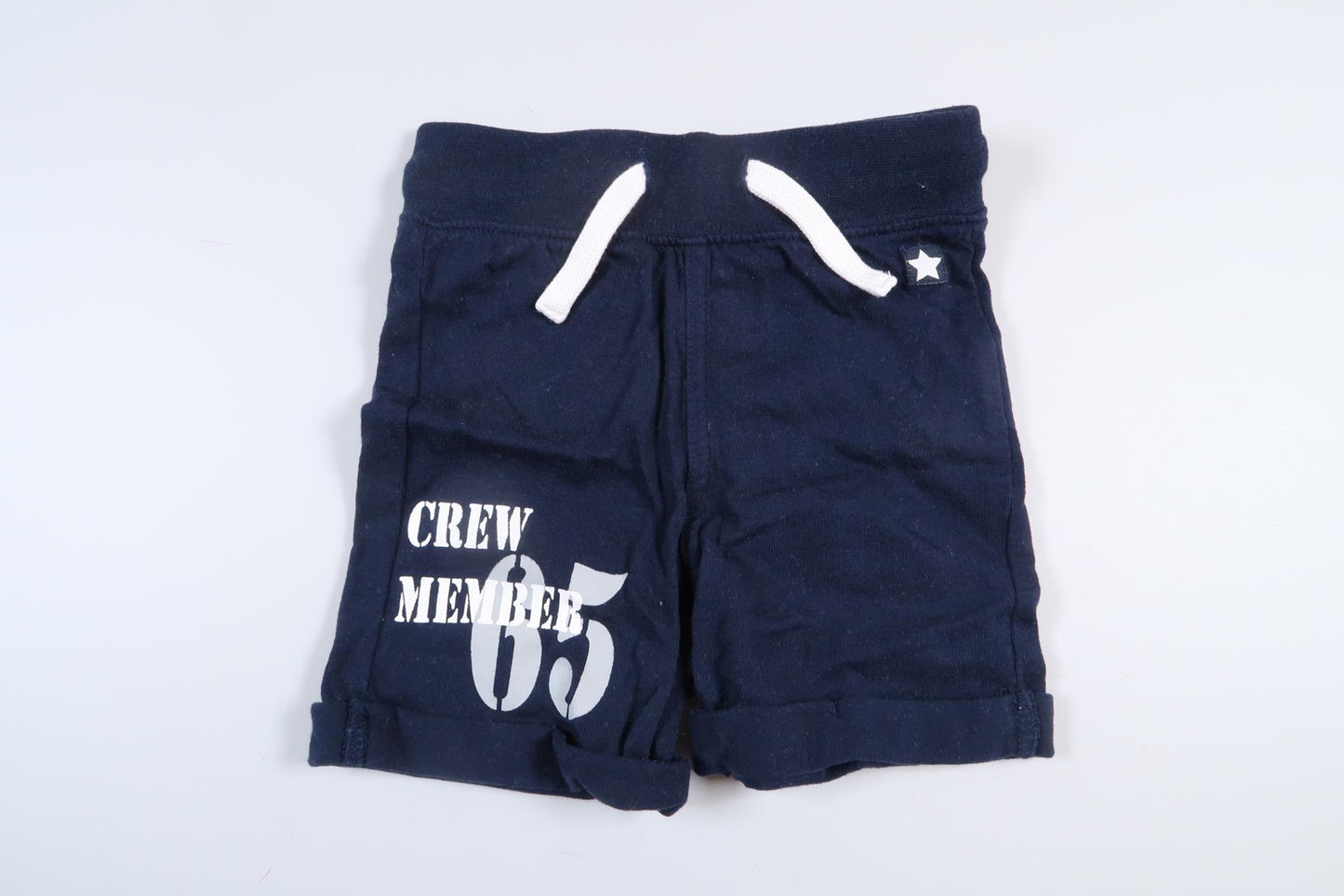 Marinblåa shorts från Walking i storlek 62