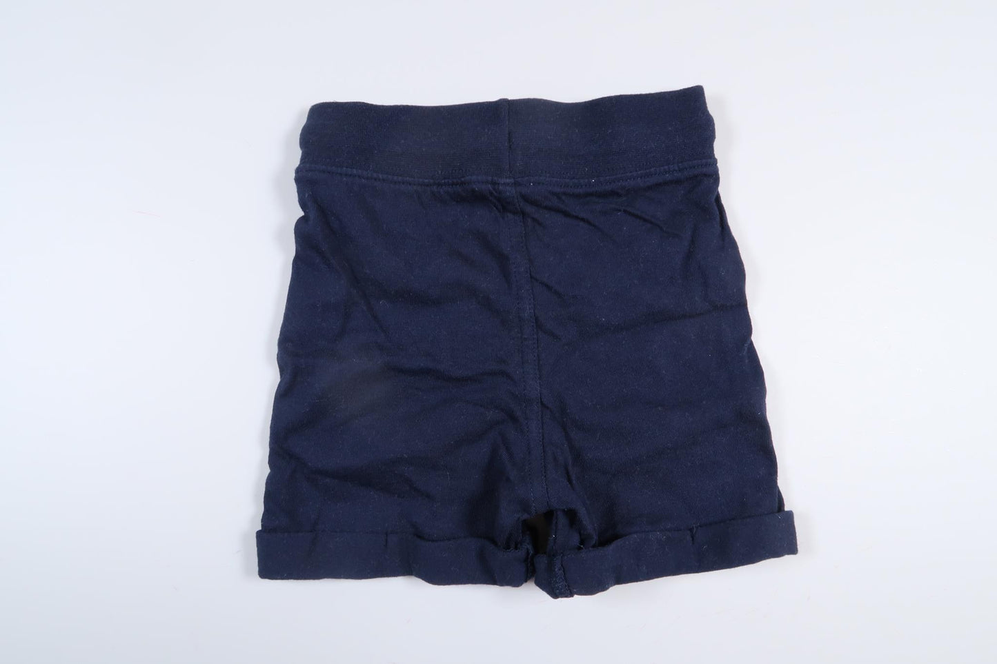 Marinblåa shorts från Walking i storlek 62