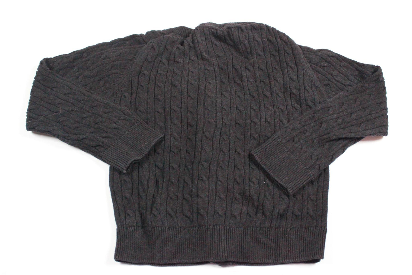 Svart stickad kofta från Skill i storlek 98/104