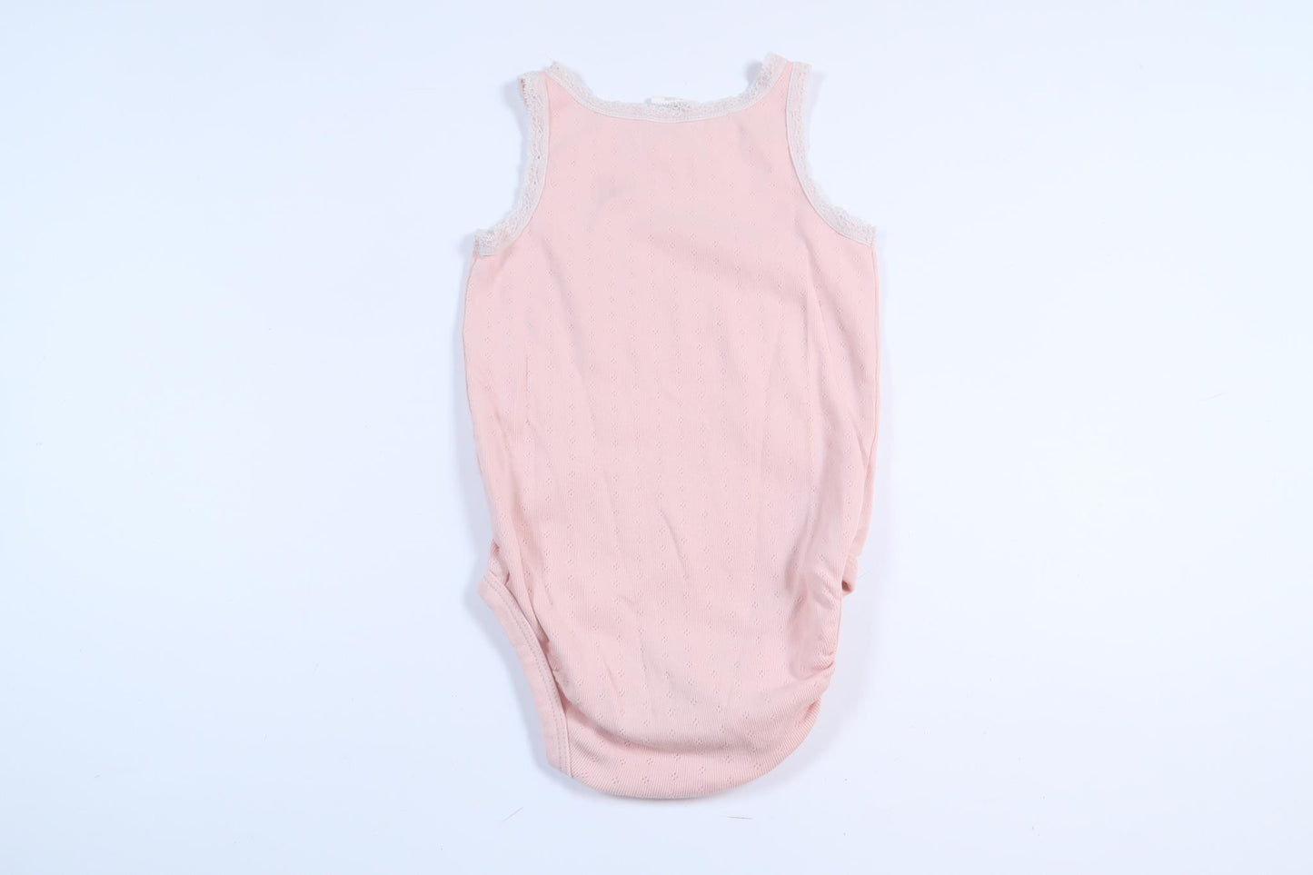 Rosa linnebody från H&M i storlek 80