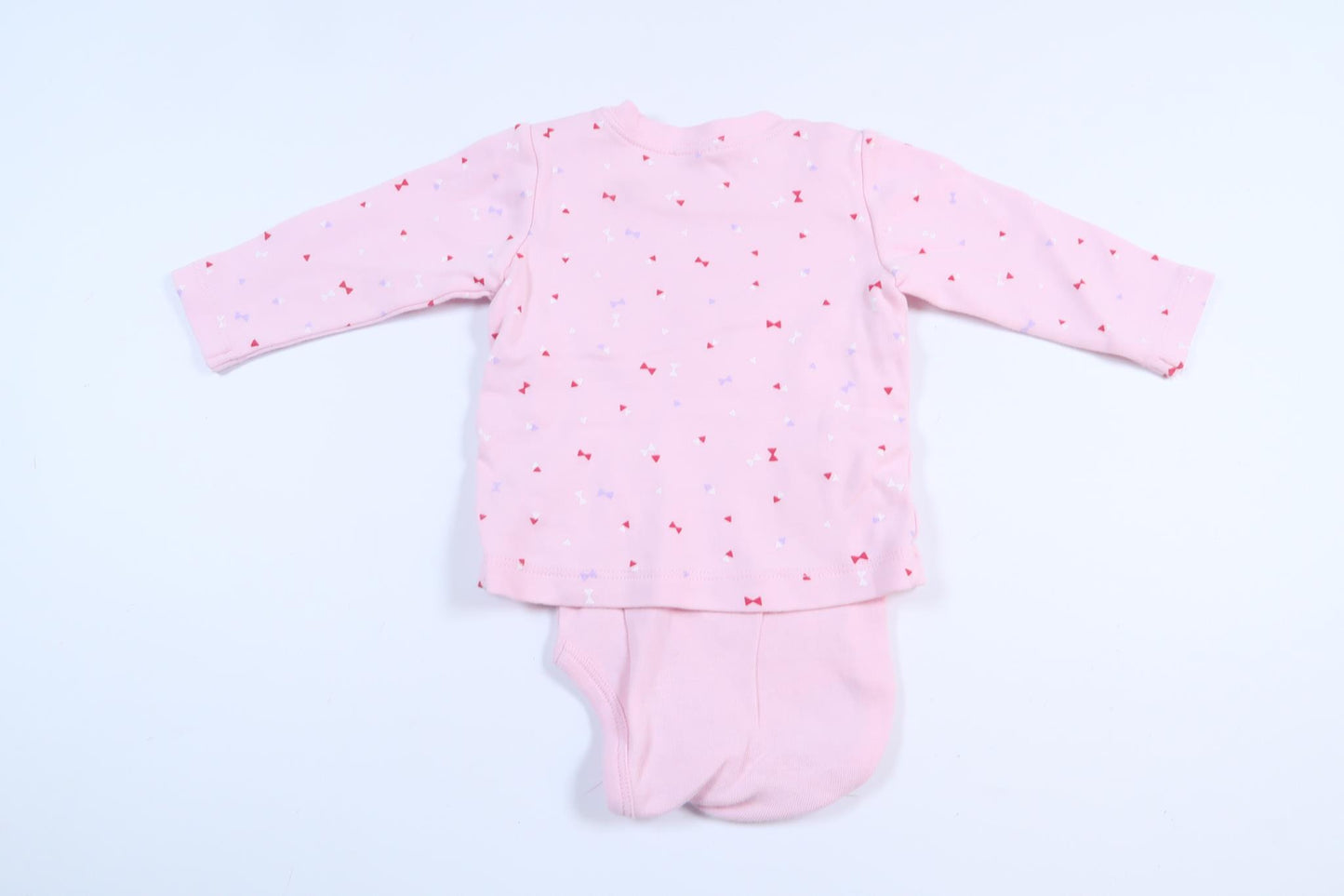 Rosa tröja med inbyggd body från Benetton i storlek 62/68