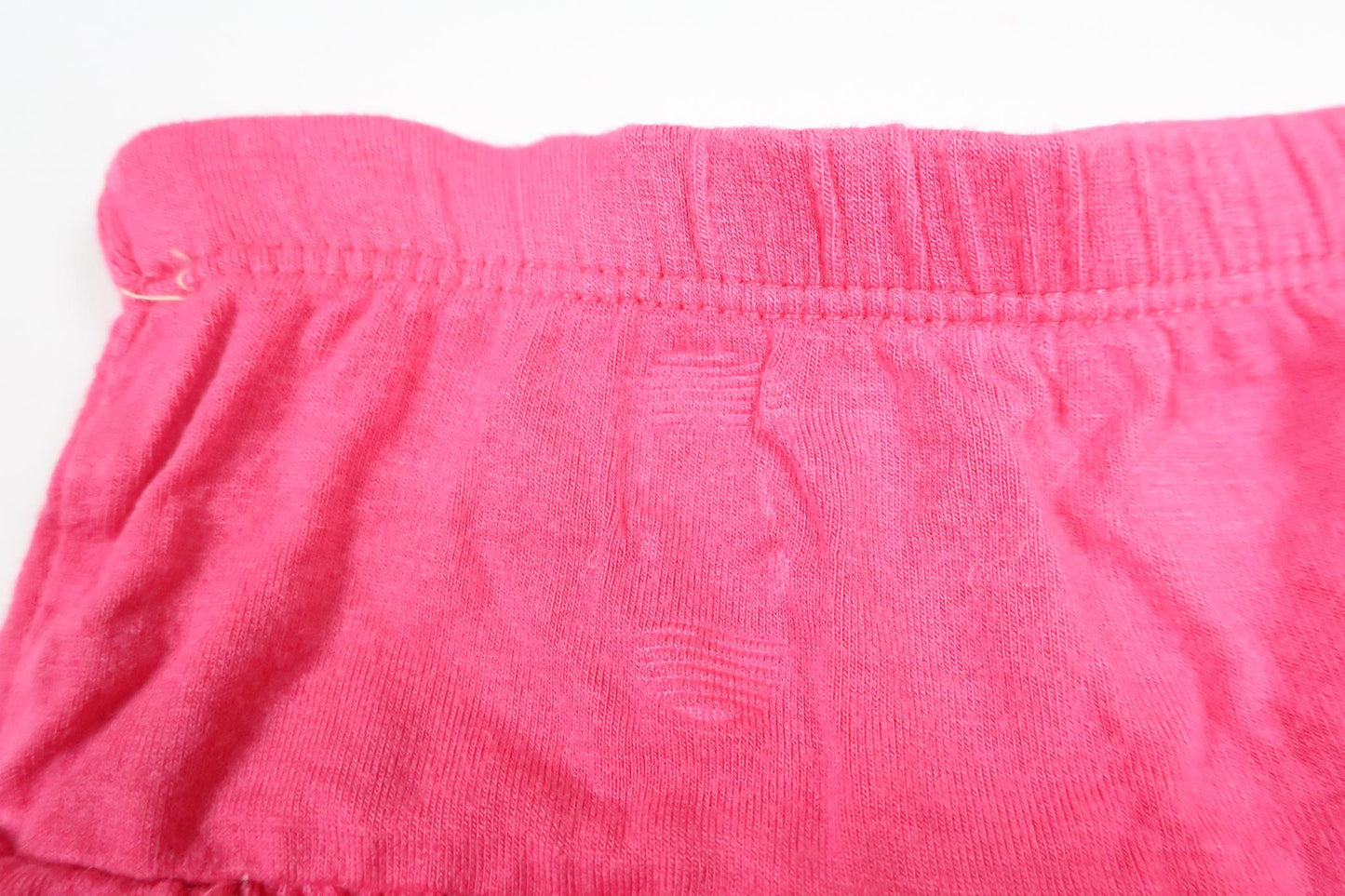 Rosa byxor med inbyggd kjol i storlek 68/74