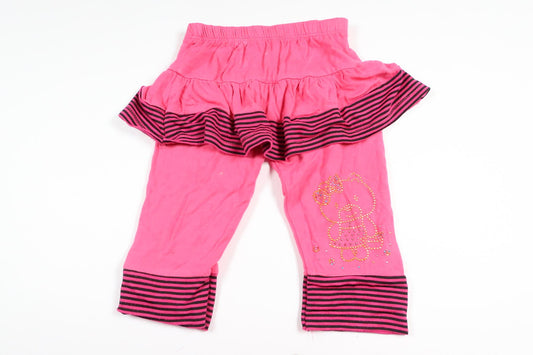 Rosa byxor med inbyggd kjol i storlek 68/74