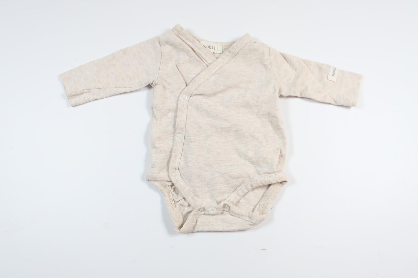 Beige långärmad omlottbody från Newbie i storlek 44