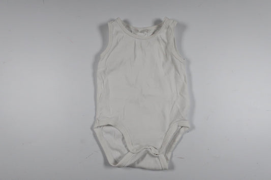 Vit linnebody i storlek 50/56