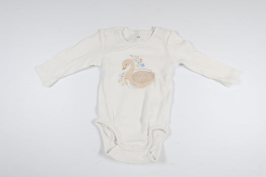 Vit långärmad body med svanar från H&M i storlek 62