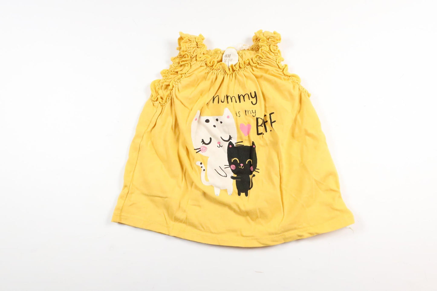 Gul kortärmad klänning med katter och text från H&M i storlek 62/68