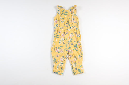 Gul blommig jumpsuit från Lindex i storlek 62
