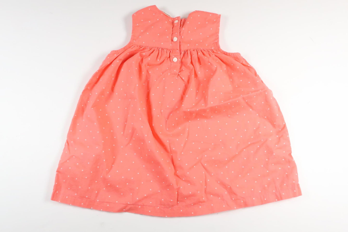 Neonrosa prickig klänning från H&M i storlek 80