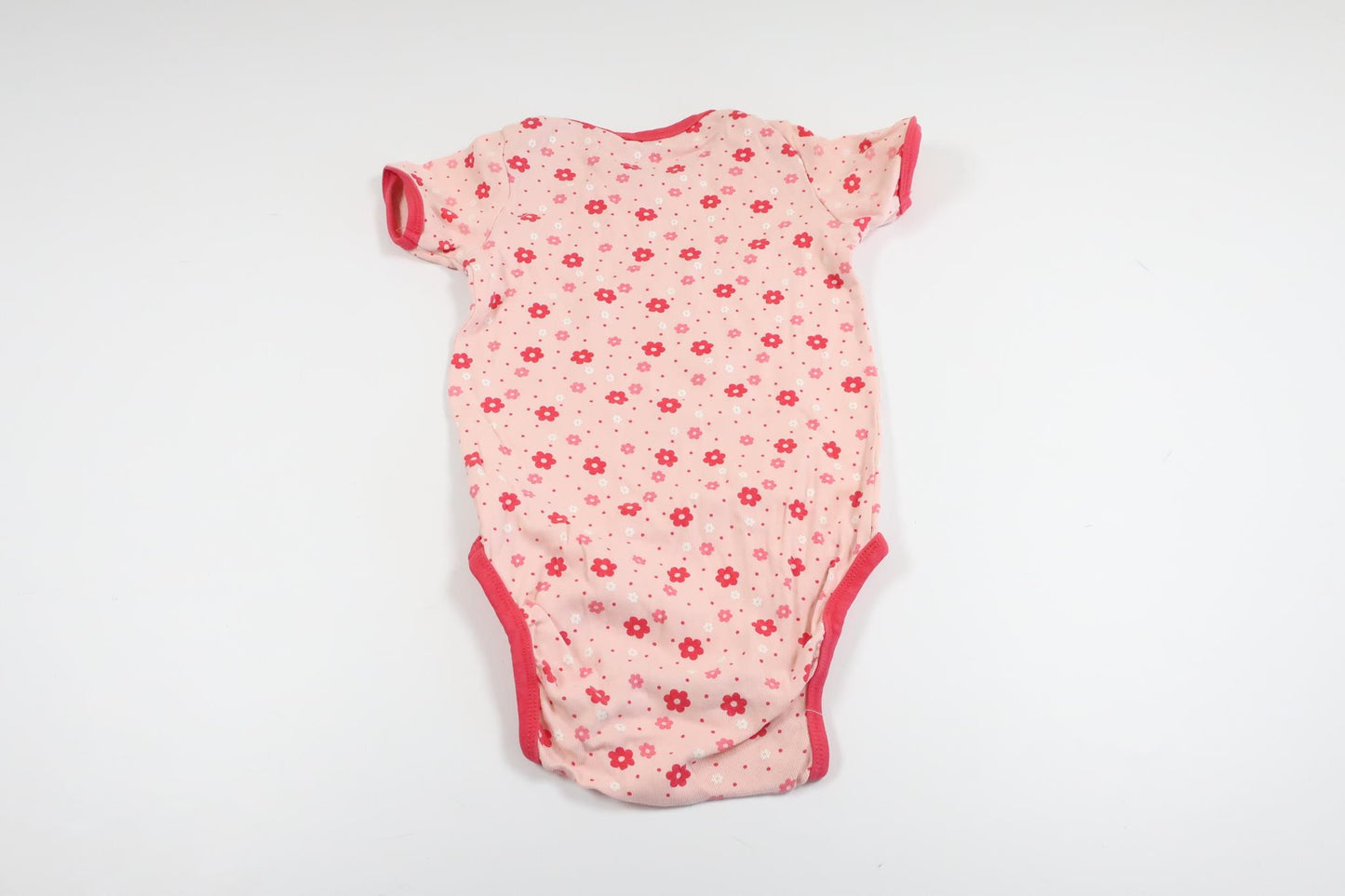 Rosa kortärmad blommig body från VRS i storlek 92