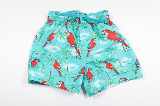 Blåa badshorts med fåglar från H&M i storlek 74/80