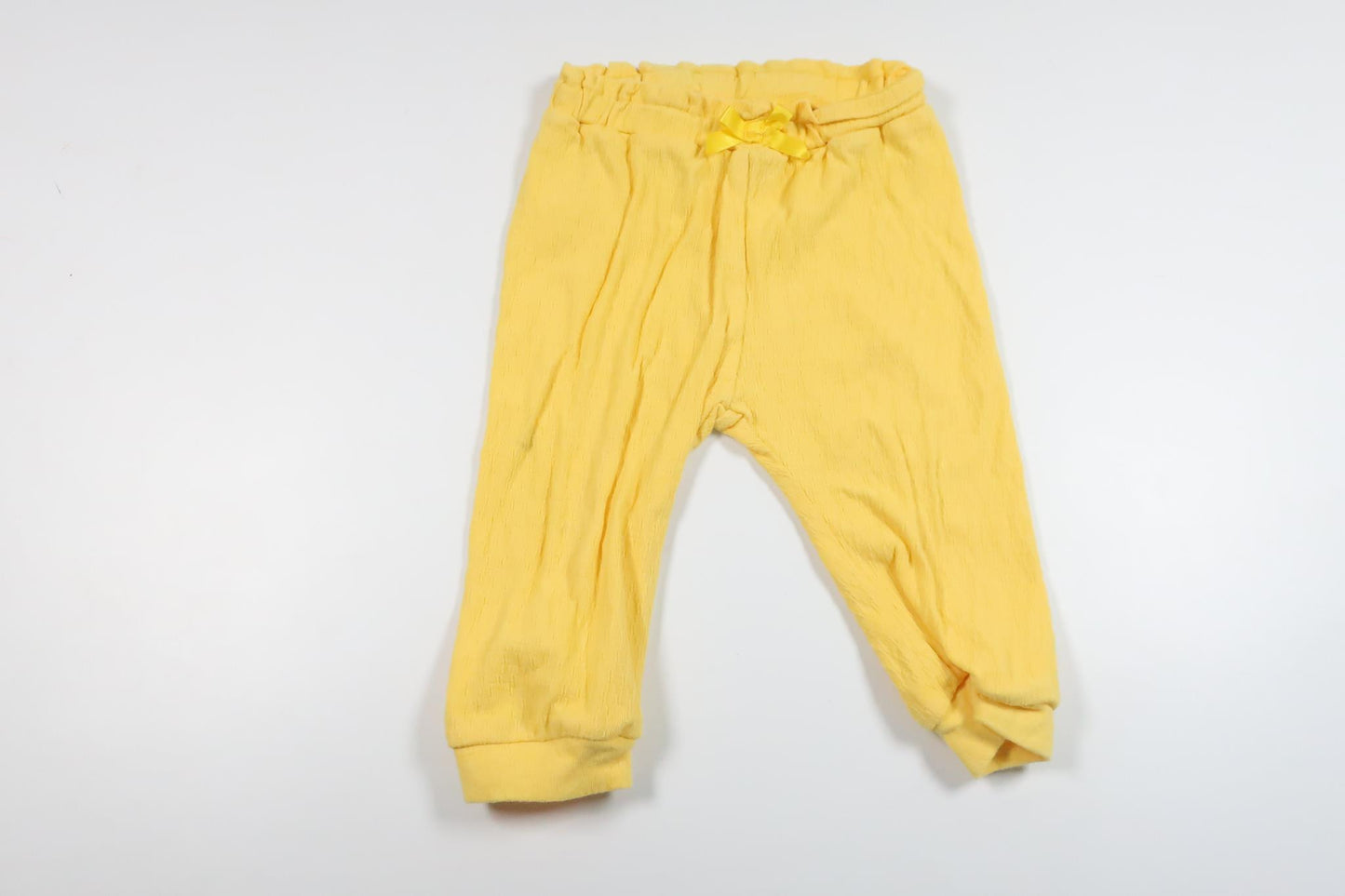 Byxor från Name It - Storlek 68 - Gul