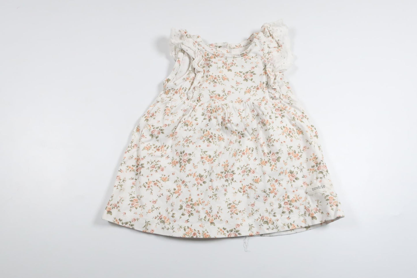 Blommig klänning från Newbie - Storlek 62 - Vit