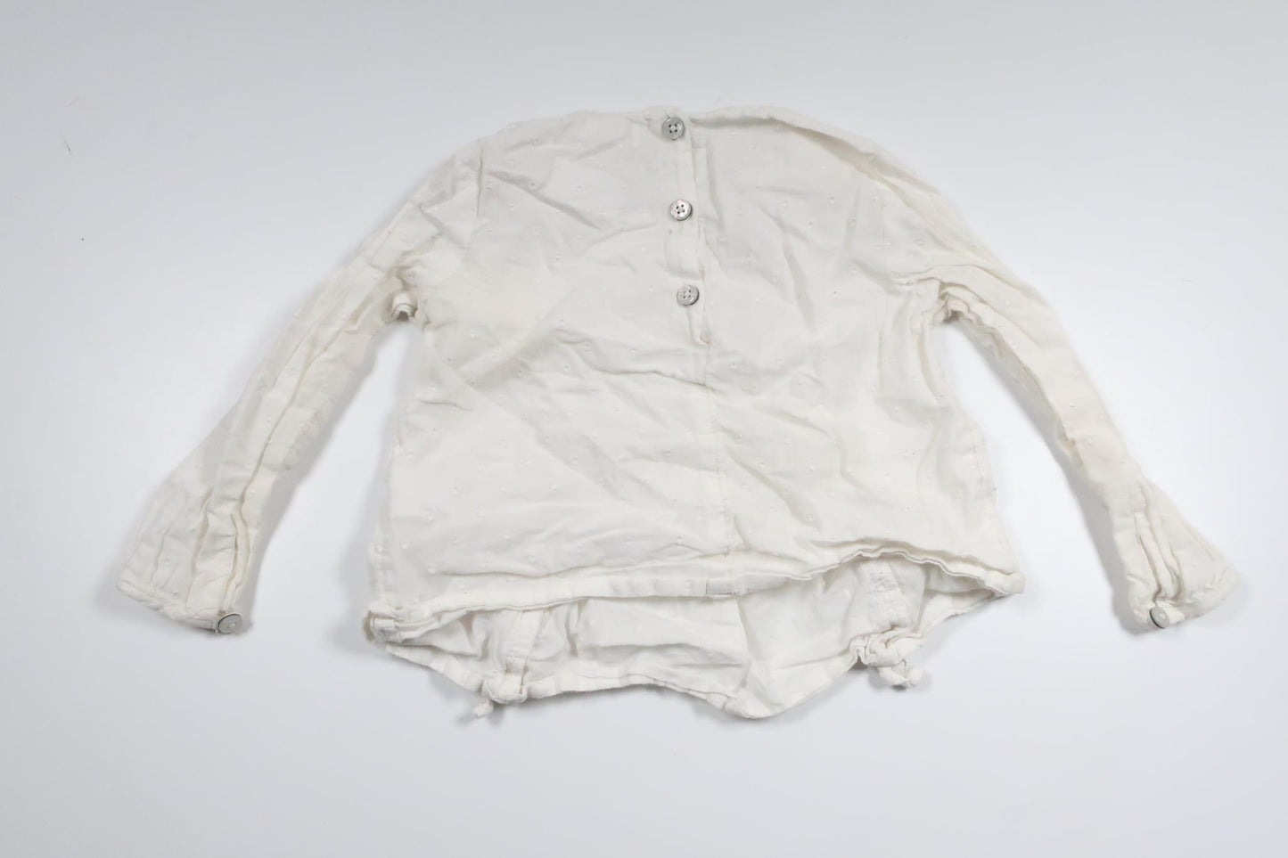 Prickig blus från Next - Storlek 80 - Vit