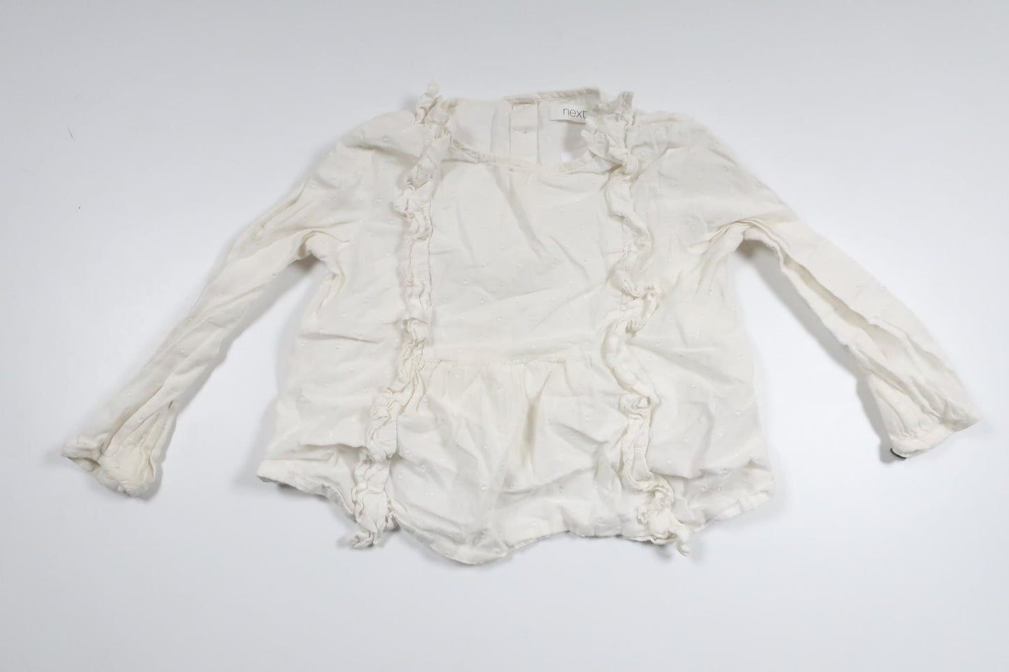 Prickig blus från Next - Storlek 80 - Vit