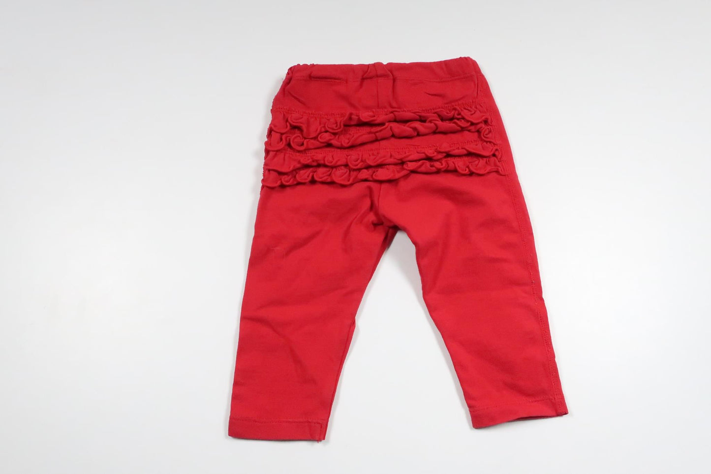 Byxor med volang från Polarn o. Pyret - Storlek 62 - Röd