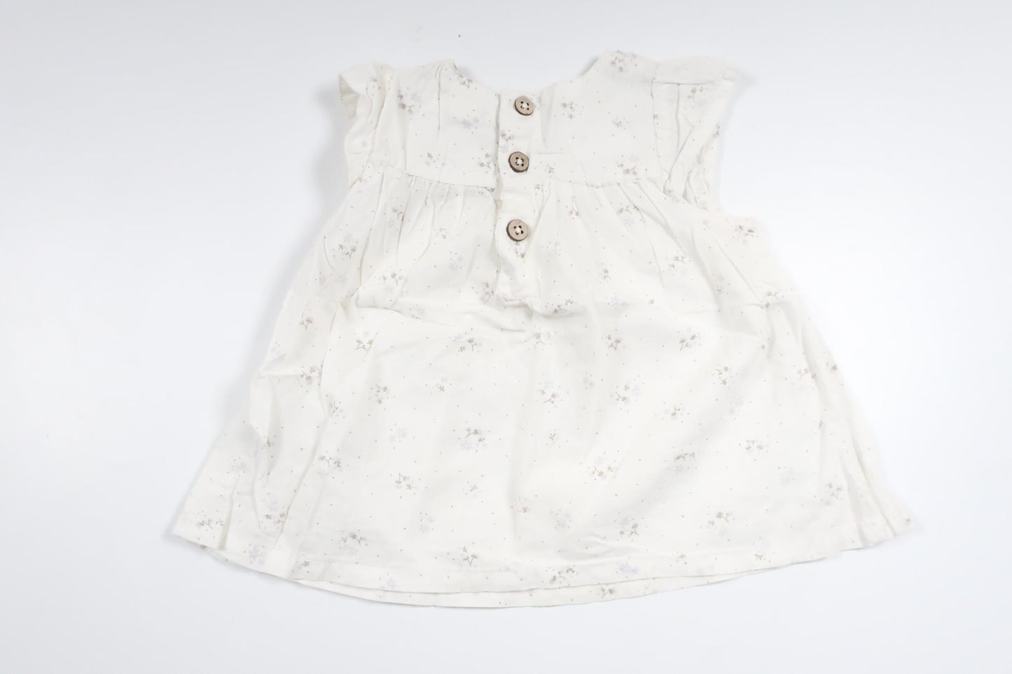 Blommig tunika från Newbie - Storlek 62 - Vit