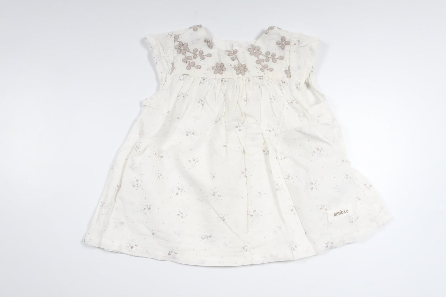 Blommig tunika från Newbie - Storlek 62 - Vit