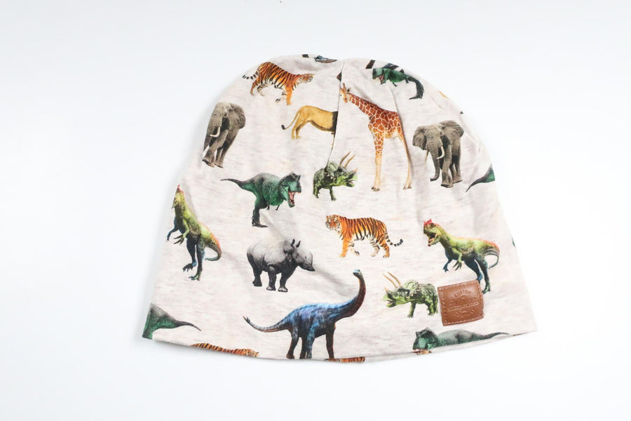 Mössa med dinosaurier från H&M - Storlek 92/104 - Grå