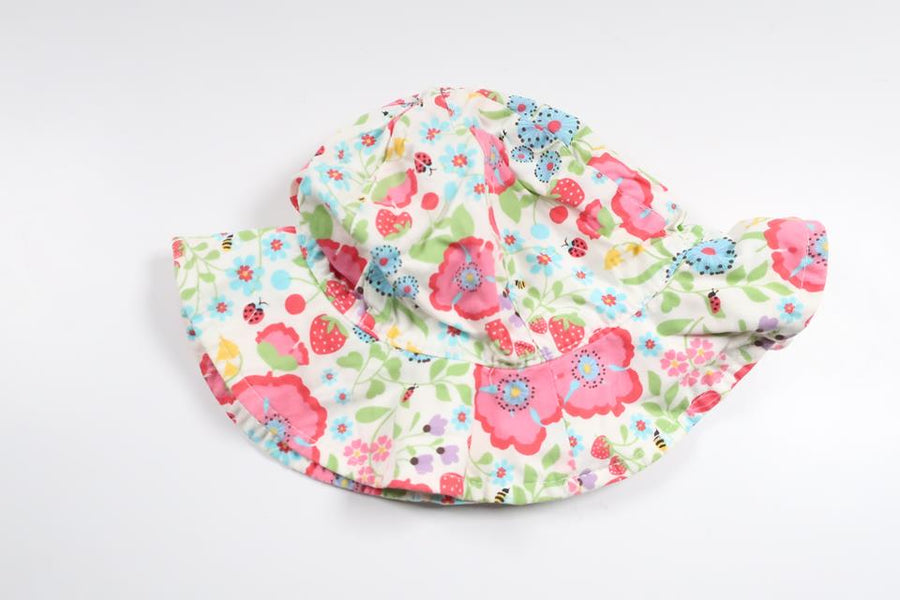 Blommig solhatt från H&M - Storlek 68 - Vit