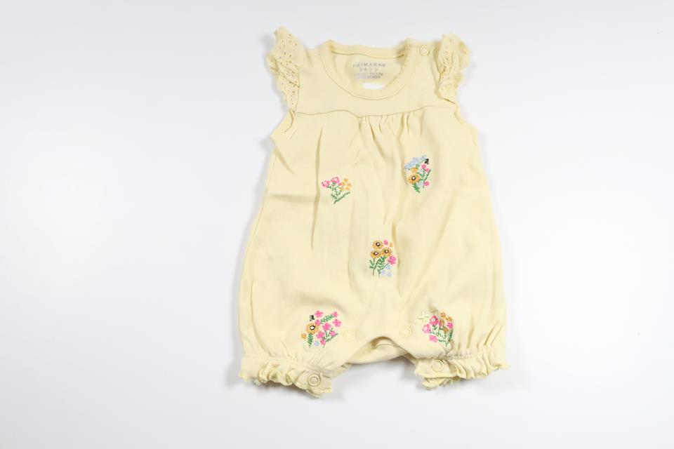 Blommig jumpsuit från Primark - Storlek 50/56 - Gul