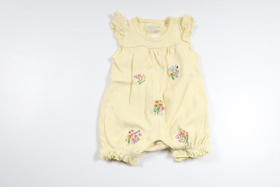 Blommig jumpsuit från Primark - Storlek 50/56 - Gul