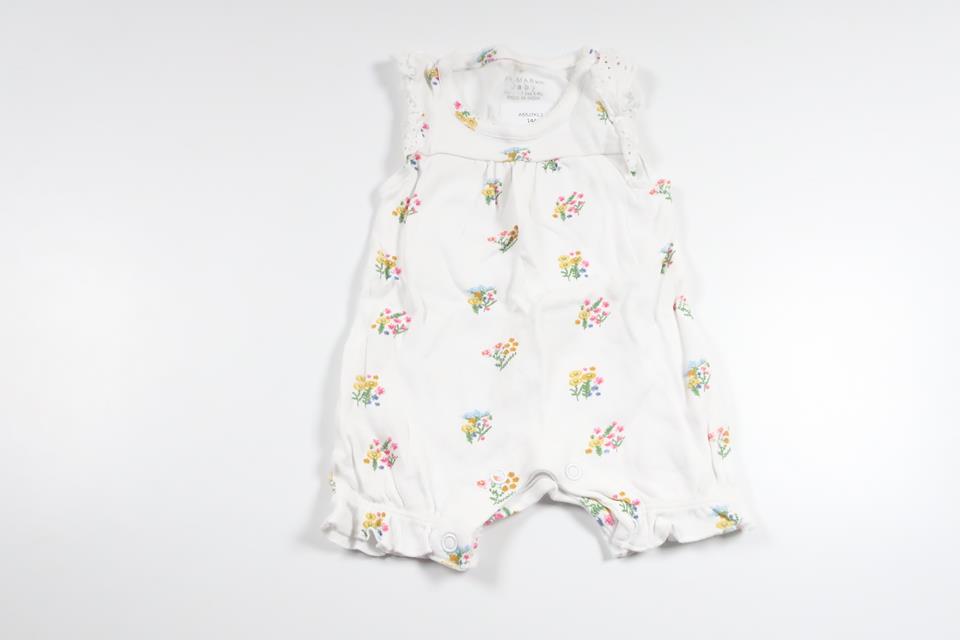 Blommig jumpsuit från Primark - Storlek 50/56 - Vit