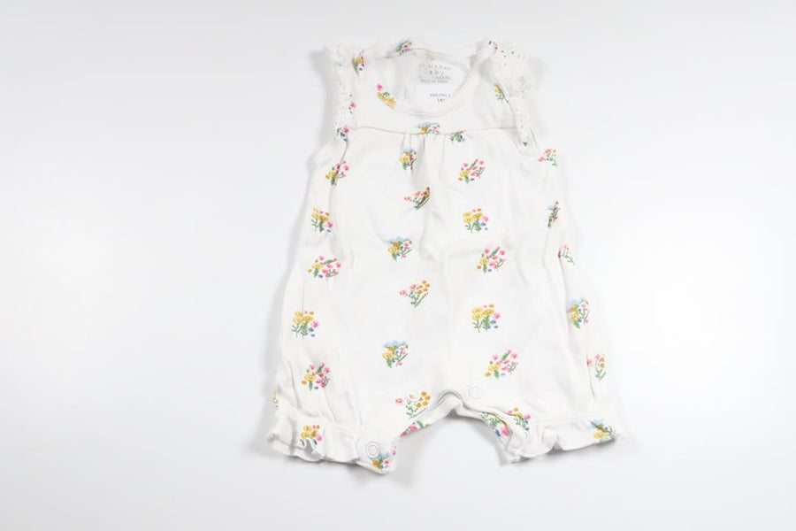 Blommig jumpsuit från Primark - Storlek 50/56 - Vit